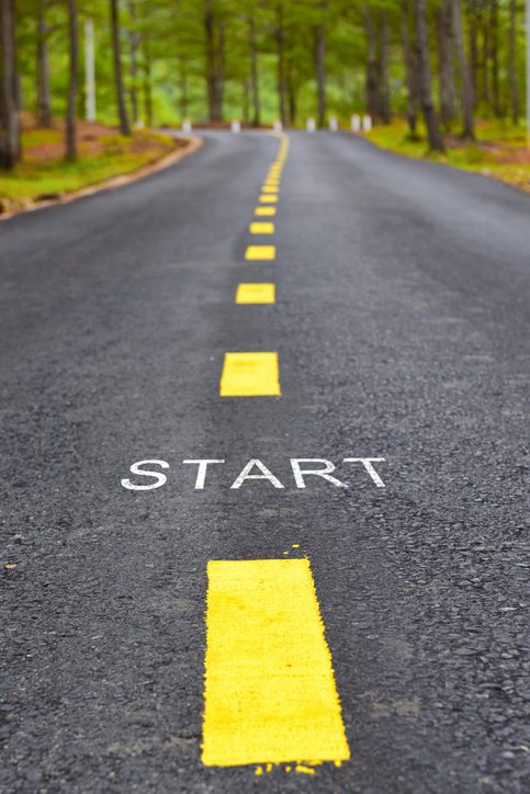 Words of start with yellow line marking on road surface